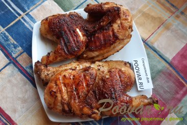 Жареная курица на сковороде Изображение